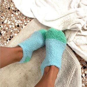 Worn used fuzzy blue socks